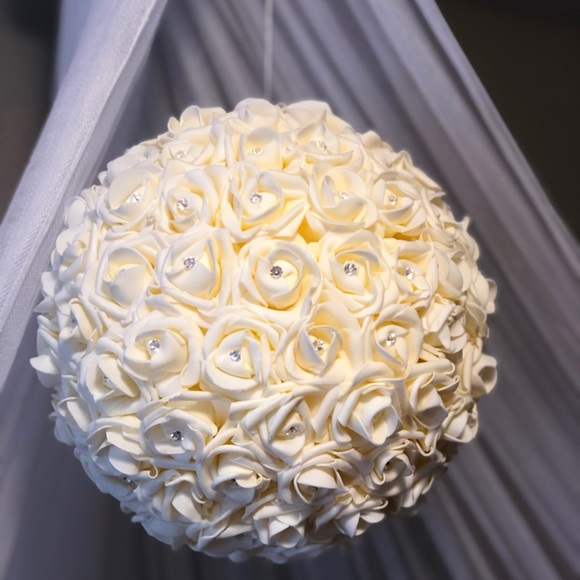 Beautiful creamy ball with diamonds.